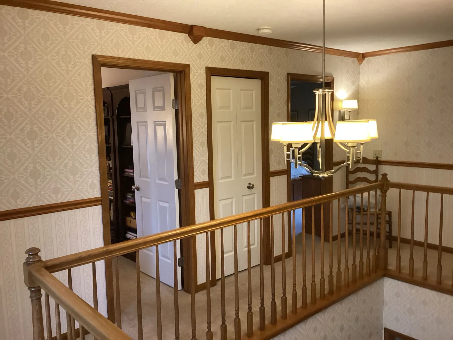 Upper landing with wallpaper